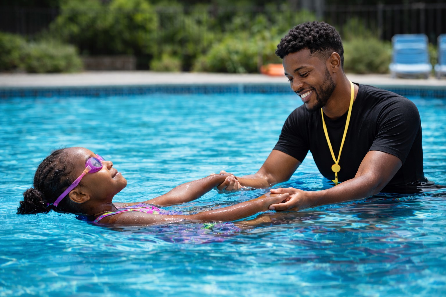Swimming Instructor with Student